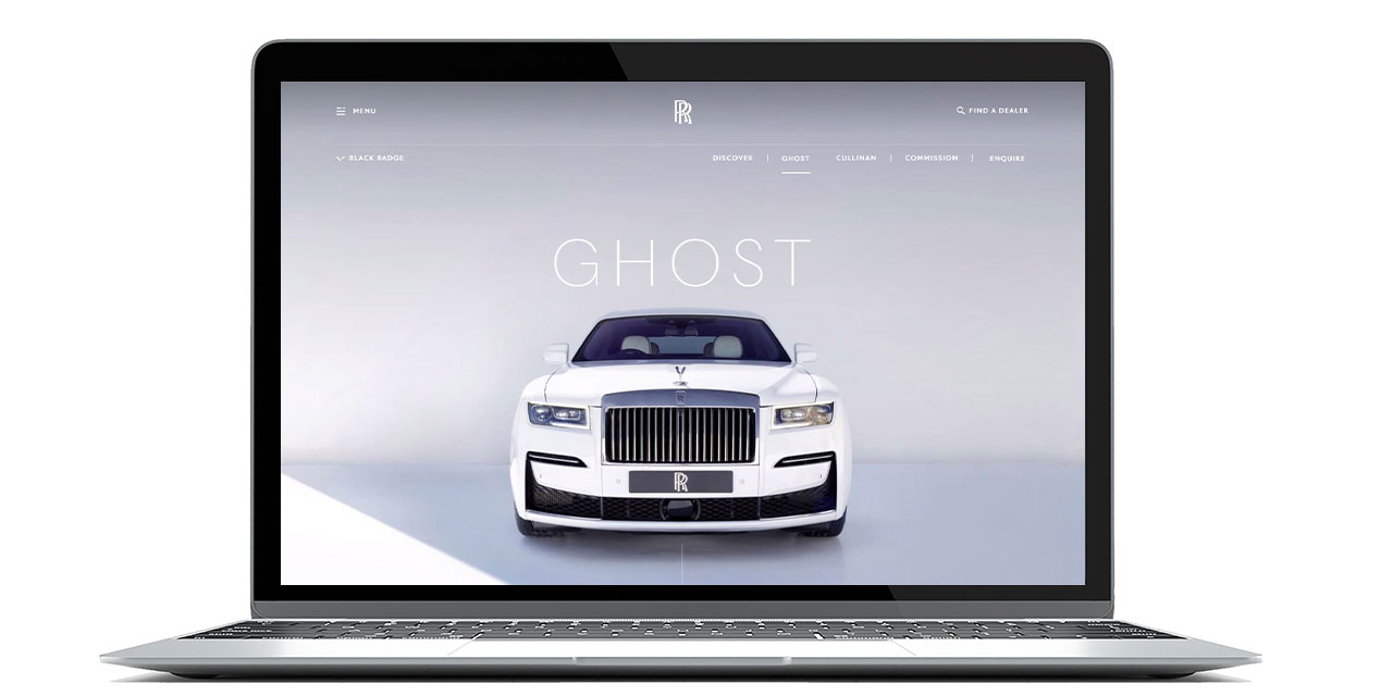 Ferrari-jev sajt za automobile prikazuje beli auto na ekranu lap topa pod nazibom Ghost.